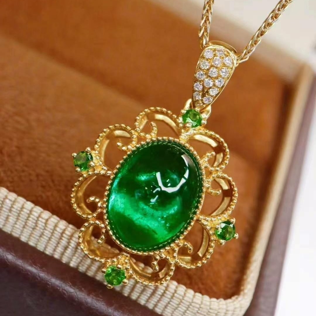 14k Gold 2.15 Ct Vivid Green Natural Emerald & Diamond & Tsavorite Pendant( Without Chain ): Ref:230949004 // gold content:14k gold // main gemstone:emerald // shape:oval // carat weight:2. 15ct // color:vivid green // treatment:natural // // adjacent gemstone 2 : diamond // shape:round // cl