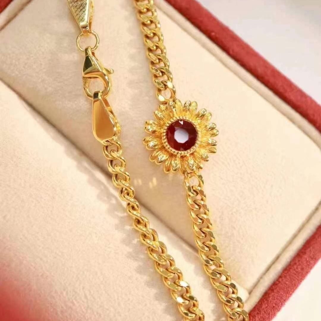 14k Gold 0.64 Ct Natural Ruby & Flowers Bracelet: Ref:230949009 // gold content:14k gold // main gemstone:ruby // shape:round // carat weight:0. 64ct // color:pigeonblood red // treatment:natural // cut grade:g // Condition: NewLow Estimate: