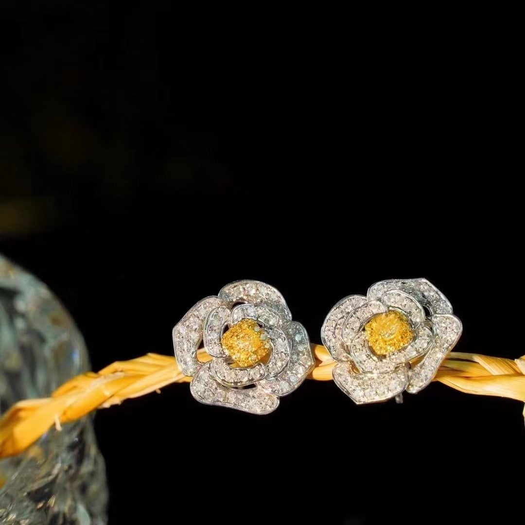 14k Gold 1.2 Ct Natural Color Diamond & Flowers Earrings: Ref:230949040 // gold content:14k gold // main gemstone:diamond // shape:multiply // carat weight:1. 2ct // clarity grade:vs-si // color:color // treatment:natural // Condition: NewLow Estimate: