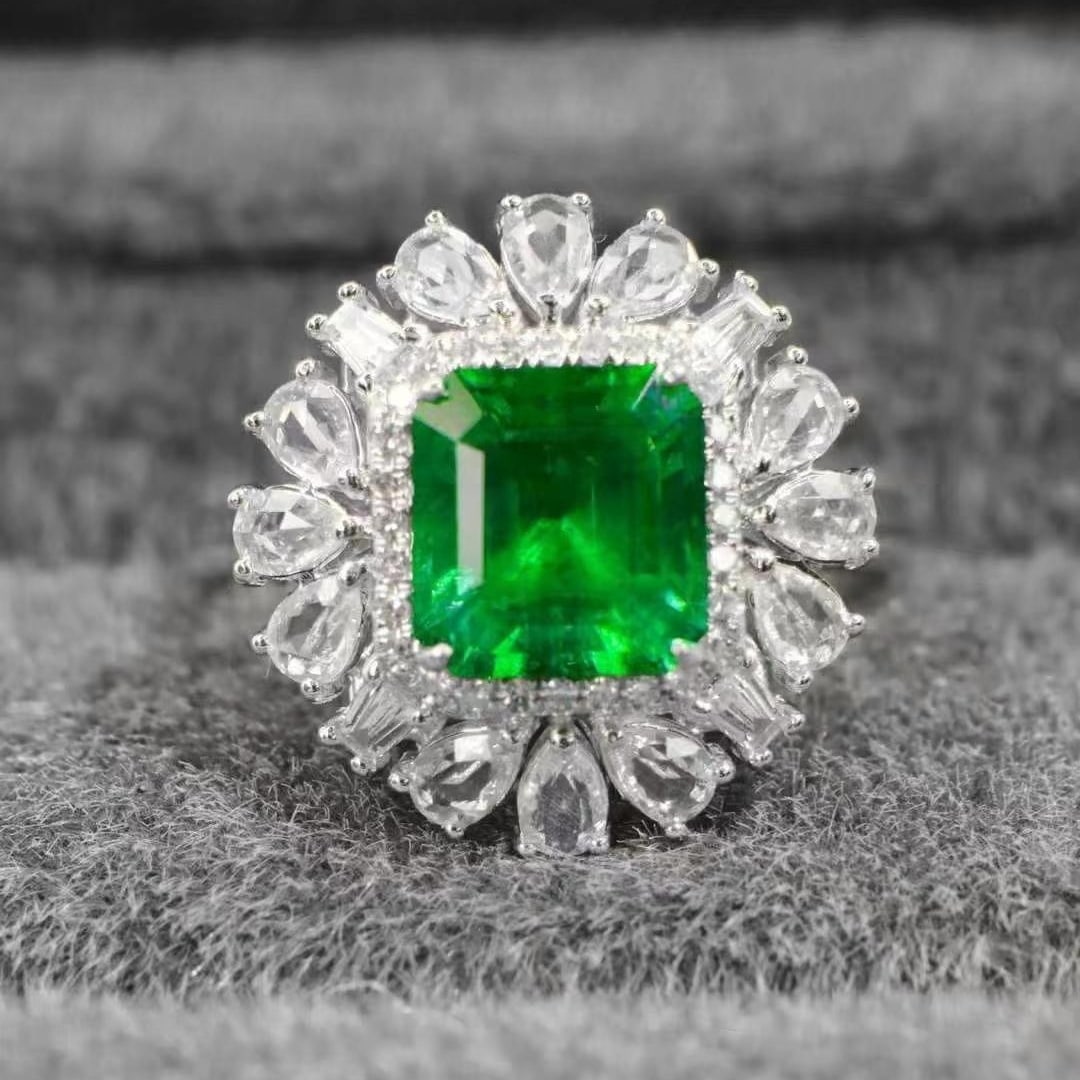 14k Gold 2.38 Ctw Vivid Green Natural Emerald & Sapphire Ring: Ref:230949056 // gold content:14k gold // ring size:7. 25us // // main gemstone:emerald // shape:octagonal // carat weight:1. 5ct // color:vivid green // treatment:natural // // adjacent gemstone 2 :
