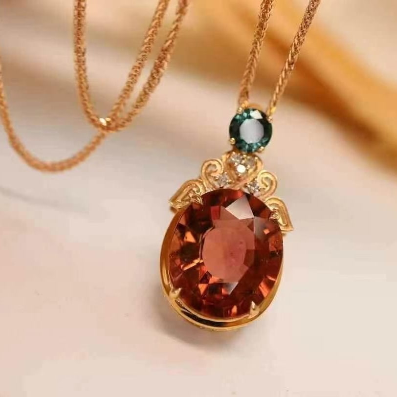 14k Gold 6.7 Ct Natural Tourmaline & Diamond Pendant( Without Chain ): Ref:230949082 // gold content:14k gold // main gemstone:tourmaline // shape:oval // carat weight:6. 7ct // color:red // treatment:natural // // adjacent gemstone 2 : diamond // shape:round //