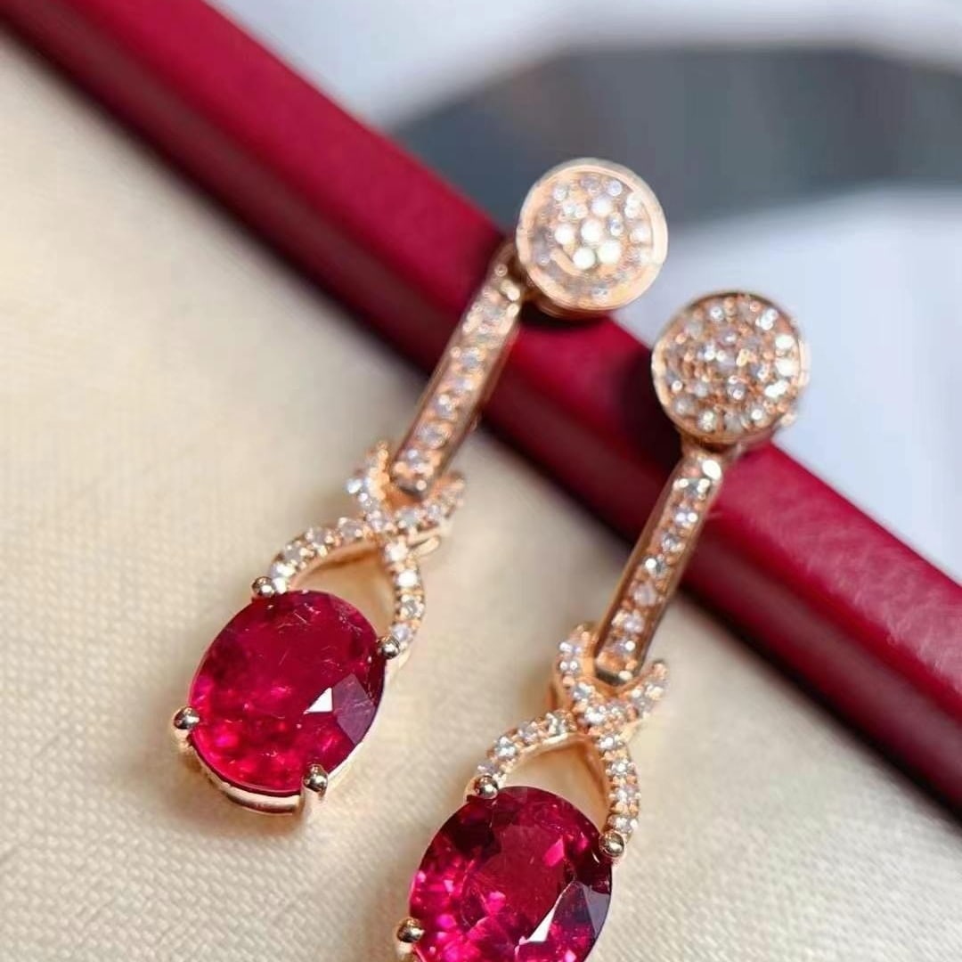 14k Gold 1.97 Ctw Natural Tourmaline & Diamond Earrings: Ref:230949089 // gold content:14k gold // main gemstone:tourmaline // shape:oval // carat weight:1. 8ct // color:red // treatment:natural // // adjacent gemstone 2 : diamond // shape:round // carat