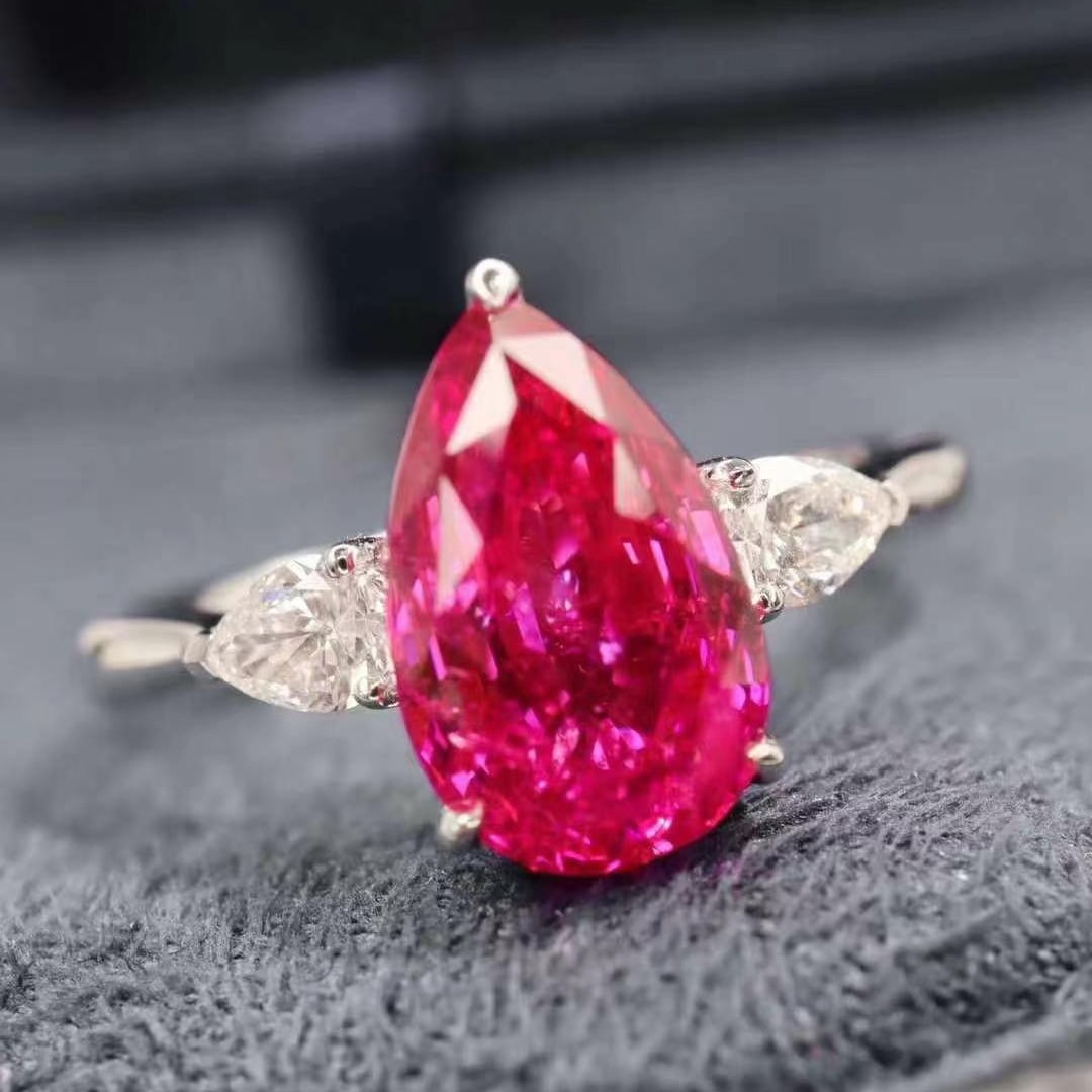 14k Gold 3.26 Ctw Natural Sapphire & Diamond Ring: Ref:230949101 // gold content:14k gold // ring size:7. 25us // // main gemstone:sapphire // shape:pear // carat weight:3. 02ct // color:pink // treatment:natural // // adjacent gemstone 2 :