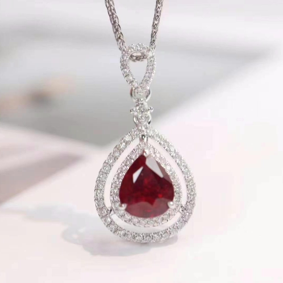 14k Gold 1.86 Ctw Natural Ruby & Diamond Pendant( Without Chain ): Ref:230949113 // gold content:14k gold // main gemstone:ruby // shape:pear // carat weight:1. 55ct // color:pigeonblood red // treatment:natural // // adjacent gemstone 2 : diamond // shape:round // c