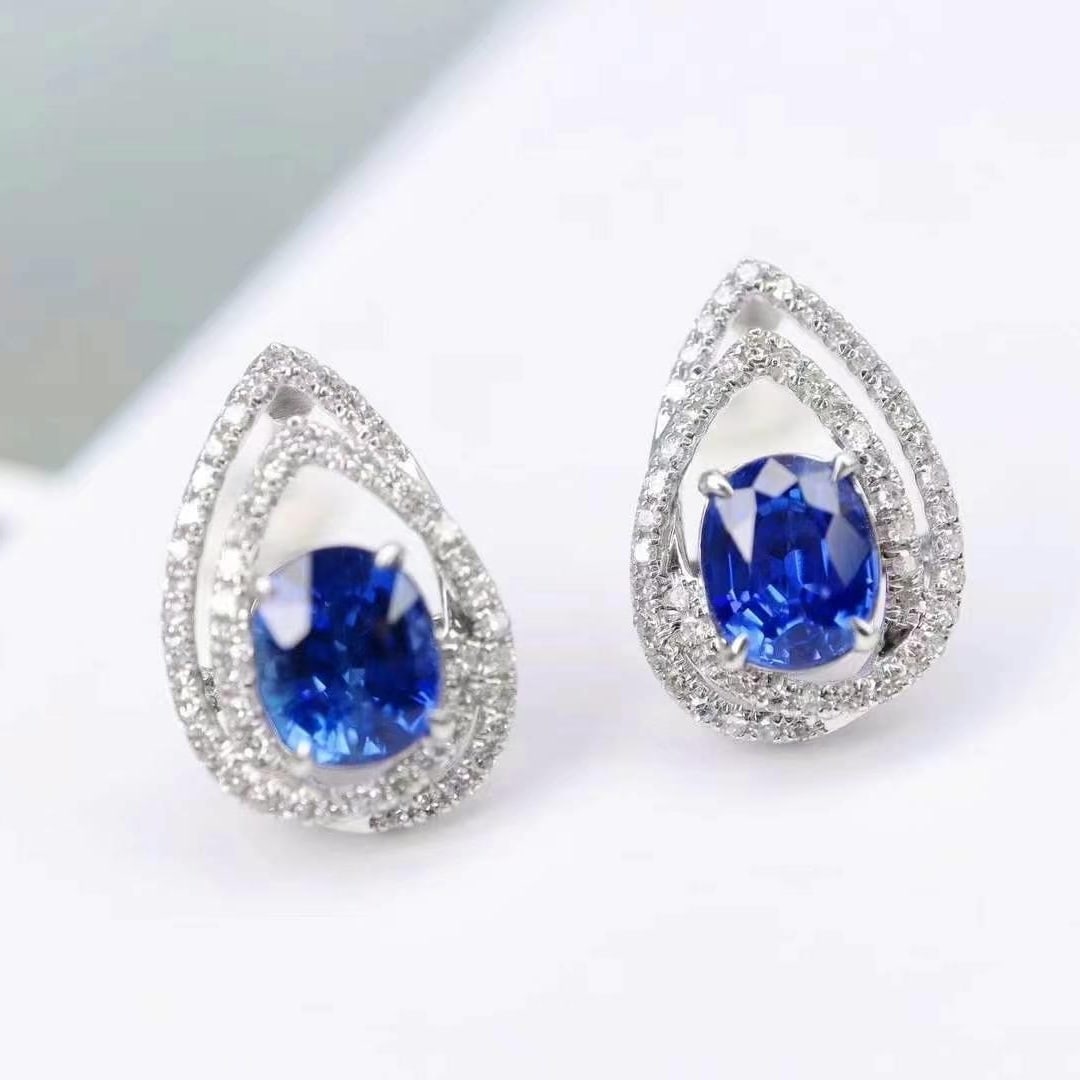 14k Gold 2.21 Ctw Natural Sapphire & Diamond Earrings: Ref:230949114 // gold content:14k gold // main gemstone:sapphire // shape:oval // carat weight:1. 9ct // color:royal blue // treatment:natural // // adjacent gemstone 2 : diamond // shape:round //