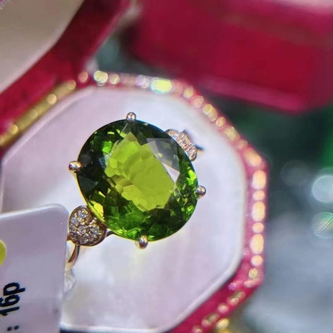 14k Gold 3 Ct Natural Tourmaline & Diamond Ring: Ref:230949116 // gold content:14k gold // ring size:7. 25us // // main gemstone:tourmaline // shape:oval // carat weight:3ct // color:green // treatment:natural // // adjacent gemstone 2 : diamond