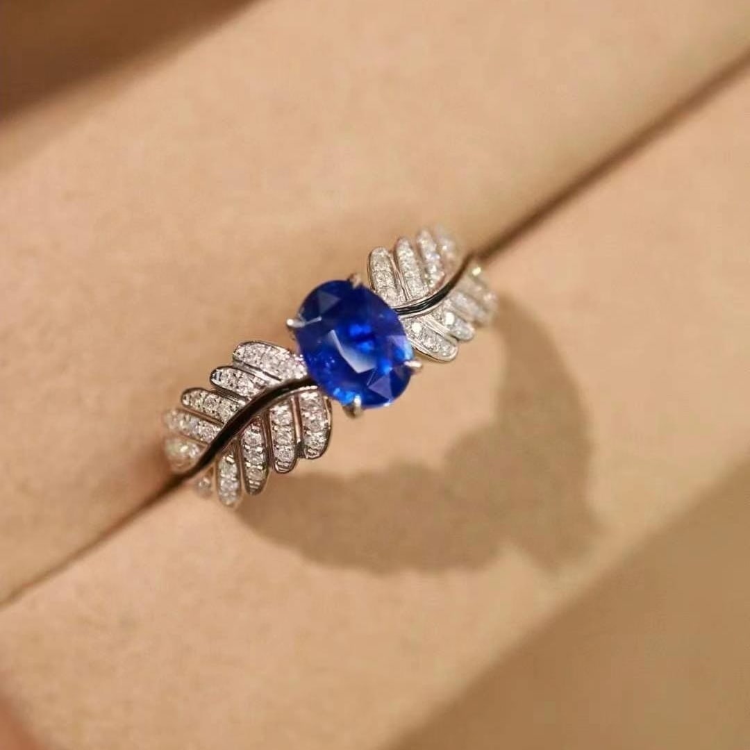 14k Gold 1.17 Ctw Vivid Blue Natural Sapphire & Diamond Ring: Ref:230949167 // gold content:14k gold // ring size:7. 25us // // main gemstone:sapphire // shape:oval // carat weight:0. 98ct // color:vivid blue // treatment:natural // // adjacent gemstone 2 : diam