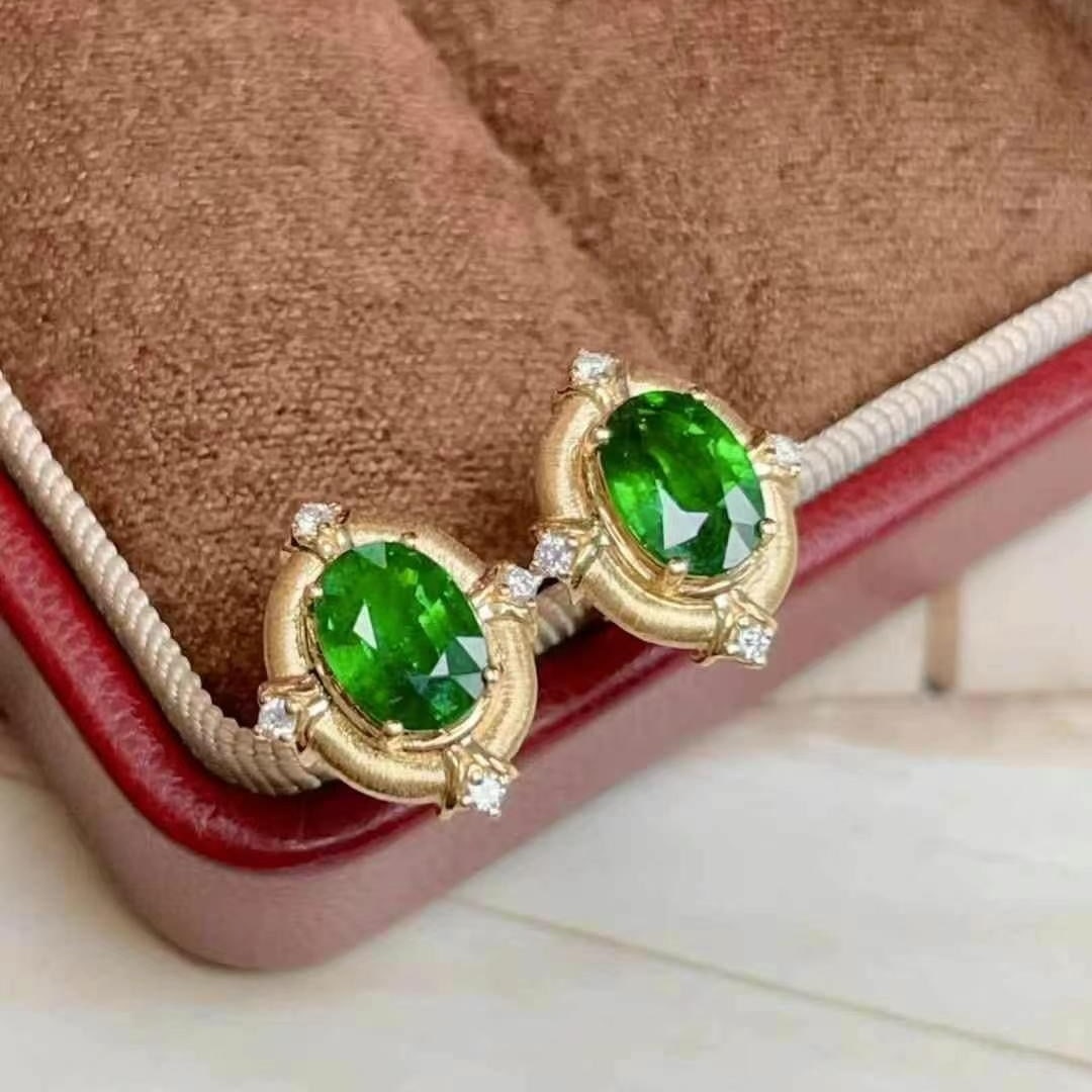 14k Gold 2.42 Ct Vivid Green Natural Tsavorite & Diamond Earrings: Ref:230949175 // gold content:14k gold // main gemstone:tsavorite // shape:oval // carat weight:2. 42ct // color:vivid green // treatment:natural // // adjacent gemstone 2 : diamond // number of