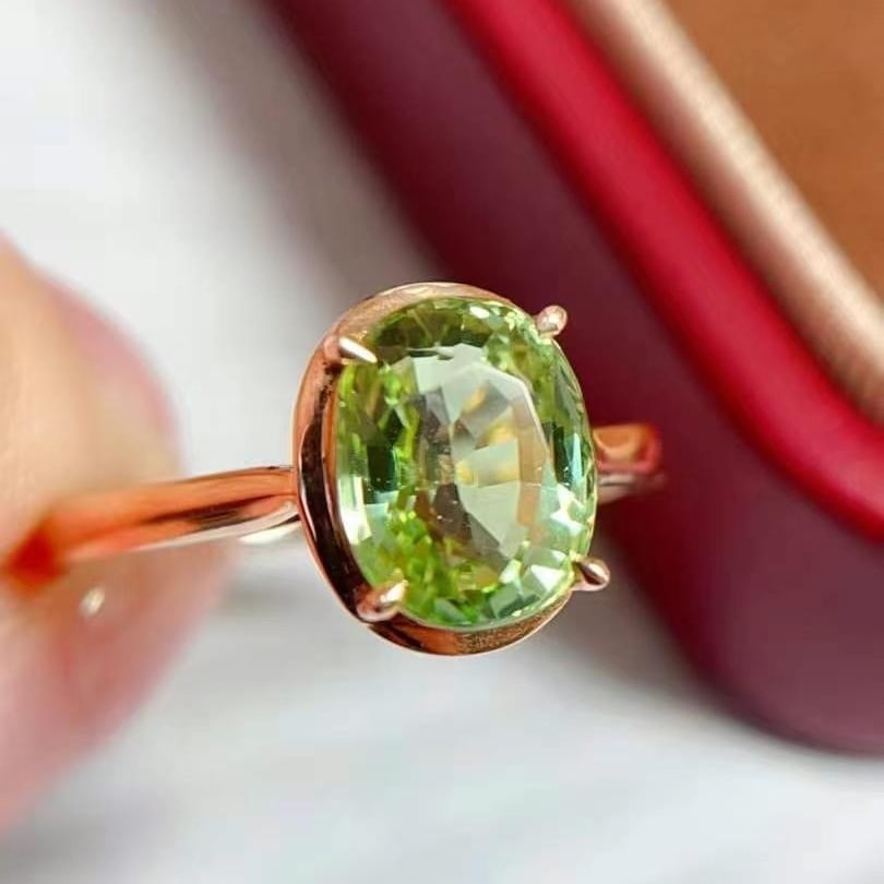 14k Gold 2 Ct Natural Tourmaline Ring: Ref:230949178 // gold content:14k gold // ring size:7. 25us // // main gemstone:tourmaline // shape:oval // carat weight:2ct // color:green // treatment:natural // Condition: New Low Estimate: 2400.0
