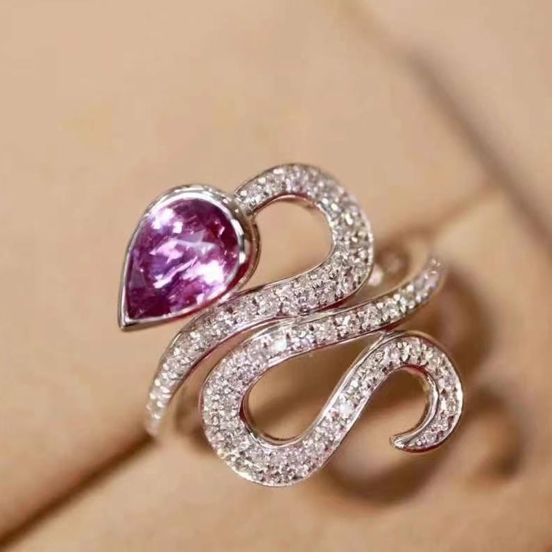 14k Gold 1.27 Ctw Natural Sapphire & Diamond Ring: Ref:230949185 // gold content:14k gold // ring size:7. 25us // // main gemstone:sapphire // shape:pear // carat weight:1. 03ct // color:purple // treatment:natural // // adjacent gemstone 2 :