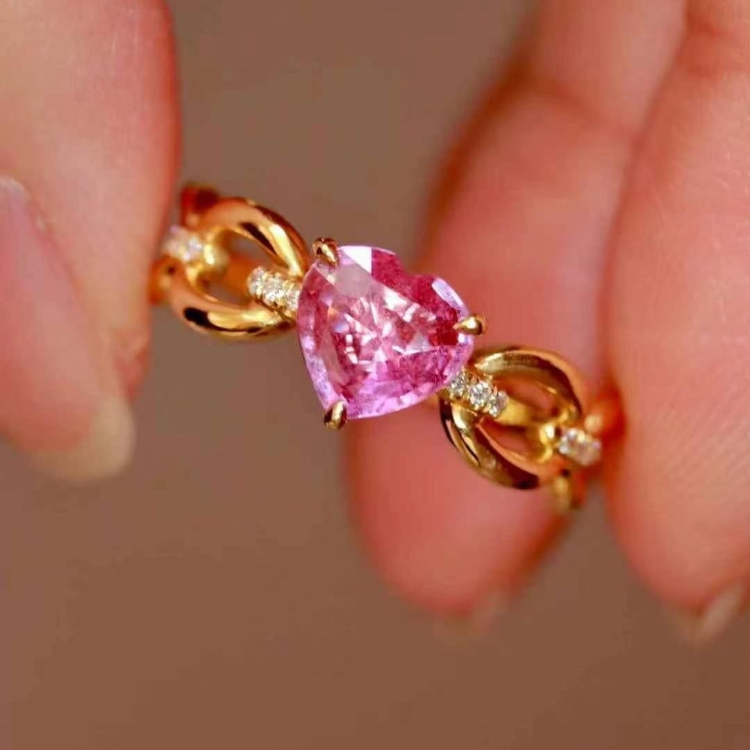 14k Gold 1.14 Ctw Natural Padparadscha Sapphire & Diamond Ring: Ref:230949191 // gold content:14k gold // ring size:7. 25us // // main gemstone:padparadscha sapphire // shape:heart // carat weight:1. 09ct // color:orangish pink // treatment:natural // //
