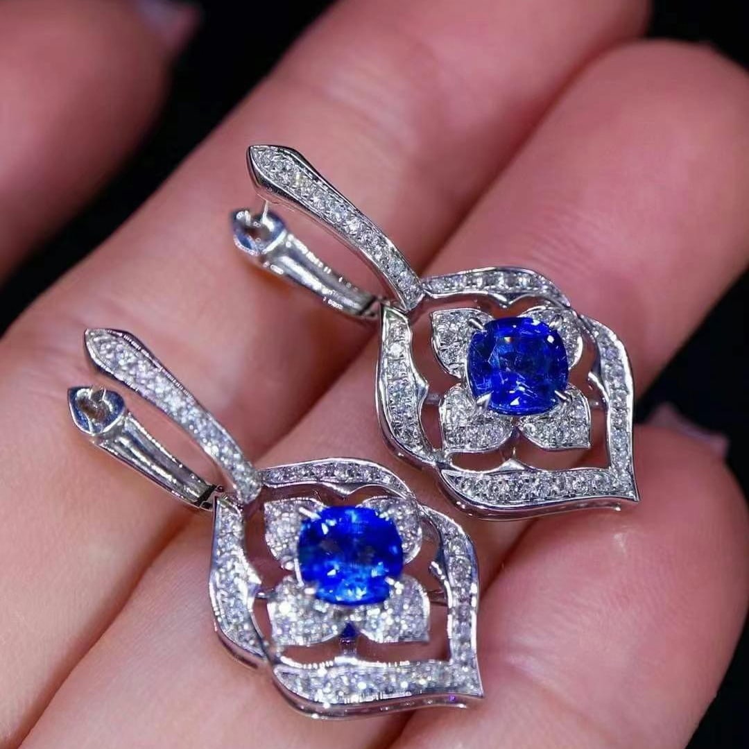 14k Gold 3.23 Ctw Natural Sapphire & Diamond Earrings: Ref:230949194 // gold content:14k gold // main gemstone:sapphire // shape:cushion // carat weight:2. 19ct // color:royal blue // treatment:natural // // adjacent gemstone 2 : diamond // shape:round //