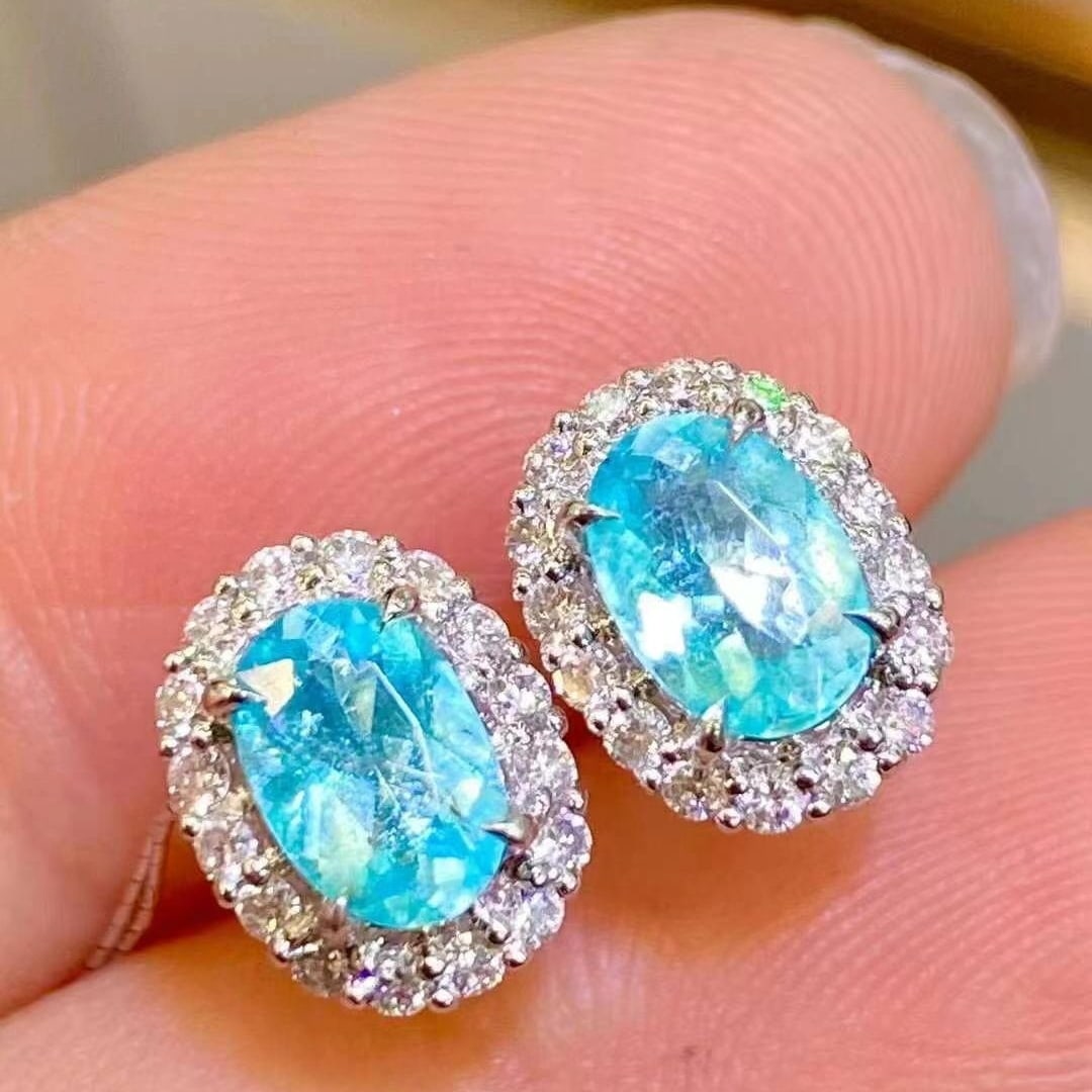 14k Gold 1.42 Ctw Natural Paraiba Tourmaline & Diamond Earrings: Ref:230949201 // gold content:14k gold // main gemstone:paraiba tourmaline // shape:oval // carat weight:1. 21ct // color:blue // treatment:natural // // adjacent gemstone 2 : diamond //
