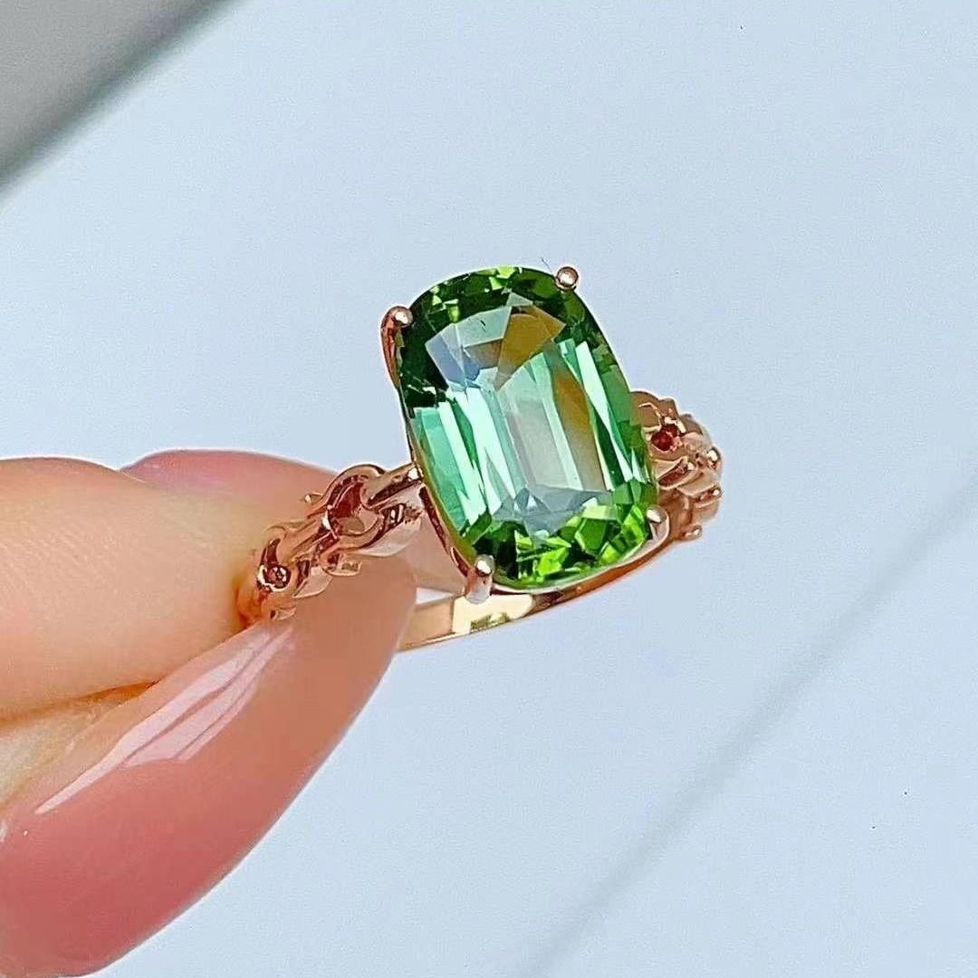 14k Gold 4.68 Ct Natural Tourmaline Ring: Ref:230949219 // gold content:14k gold // ring size:7. 25us // // main gemstone:tourmaline // shape:cushion // carat weight:4. 68ct // color:green // treatment:natural // Condition: NewLow