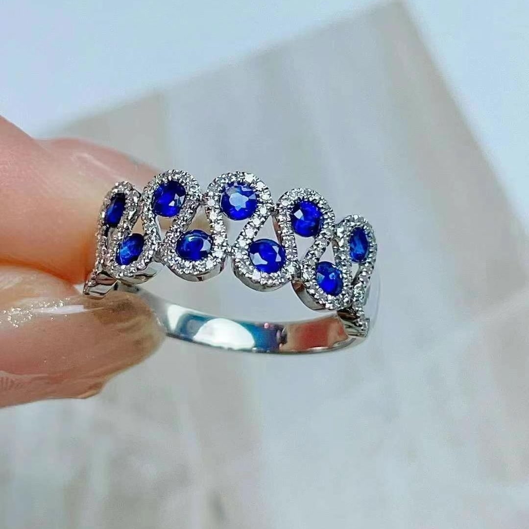14k Gold 0.78 Ct Vivid Blue Natural Sapphire & Diamond Ring: Ref:230949227 // gold content:14k gold // ring size:7. 25us // // main gemstone:sapphire // shape:round // carat weight:0. 78ct // color:vivid blue // treatment:natural // cut grade:g // // adjacent g