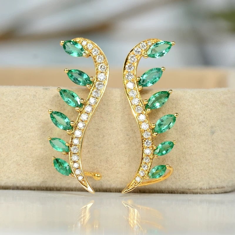 14k Gold 1.74 Ctw Natural Emerald & Diamond Earrings: Ref:230950007 // gold content:14k gold // main gemstone:emerald // shape:marquise // carat weight:1. 39ct // color:green // treatment:natural // // adjacent gemstone 2 : diamond // shape:round // cara