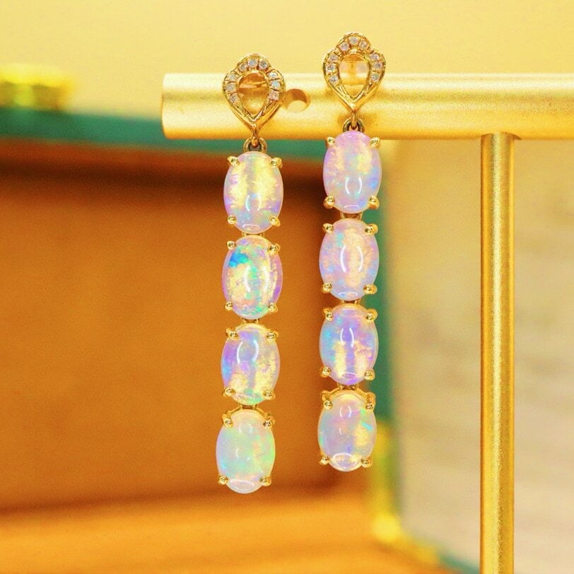 14k Gold 3.41 Ctw Natural Opal & Diamond Earrings: Ref:230950019 // gold content:14k gold // main gemstone:opal // shape:oval // carat weight:3. 36ct // color:white // treatment:natural // // adjacent gemstone 2 : diamond // number of stones:18 // sha