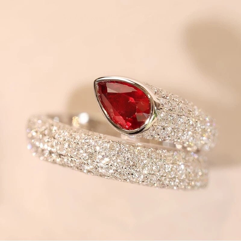 14k Gold 2.4 Ctw Natural Ruby & Diamond Ring: Ref:230950024 // gold content:14k gold // ring size:7. 25us // // main gemstone:ruby // shape:pear // carat weight:1. 1ct // color:pigeonblood red // treatment:natural // // adjacent gemstone 2 : diam