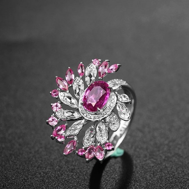 14k Gold 1.98 Ctw Natural Padparadscha Sapphire & Diamond Ring: Ref:230950085 // gold content:14k gold // ring size:7. 25us // // main gemstone:padparadscha sapphire // shape:oval // carat weight:1. 22ct // color:orangish pink // treatment:natural // // adjacent g