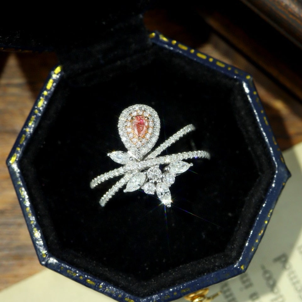 14k Gold 0.65 Ctw Natural Pink Diamond & Diamond Ring: Ref:230950109 // gold content:14k gold // ring size:7. 25us // // main gemstone:pink diamond // shape:pear // carat weight:0. 07ct // color:pink // treatment:natural // // adjacent gemstone 2 :