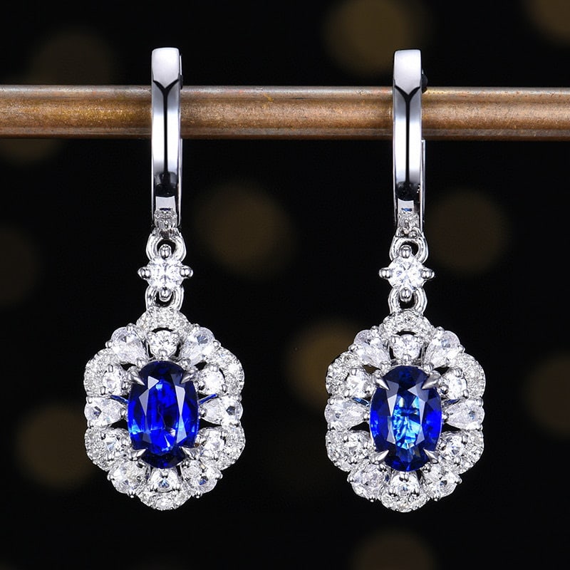 14k Gold 1.05 Ctw Vivid Blue Natural Sapphire & Diamond Earrings: Ref:230950123 // gold content:14k gold // main gemstone:sapphire // shape:oval // carat weight:0. 96ct // color:vivid blue // treatment:natural // // adjacent gemstone 2 : diamond // number of stones: