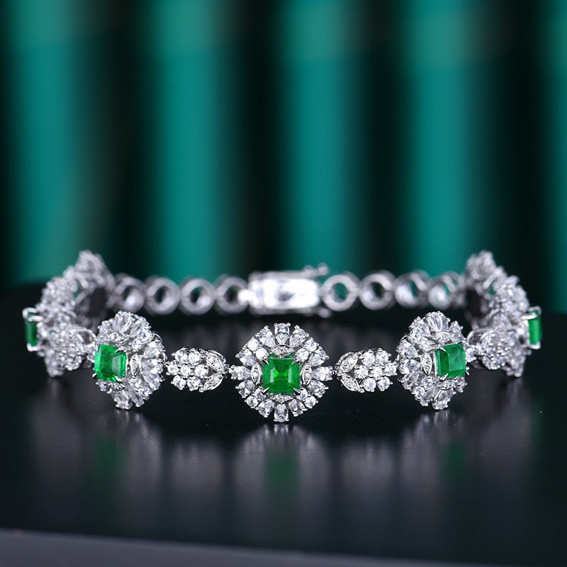 14k Gold 2.25 Ctw Vivid Green Natural Emerald & Diamond Bracelet: Ref:230950171 // gold content:14k gold // main gemstone:emerald // shape:octagonal // carat weight:2. 15ct // color:vivid green // treatment:natural // // adjacent gemstone 2 : diamond // number of st