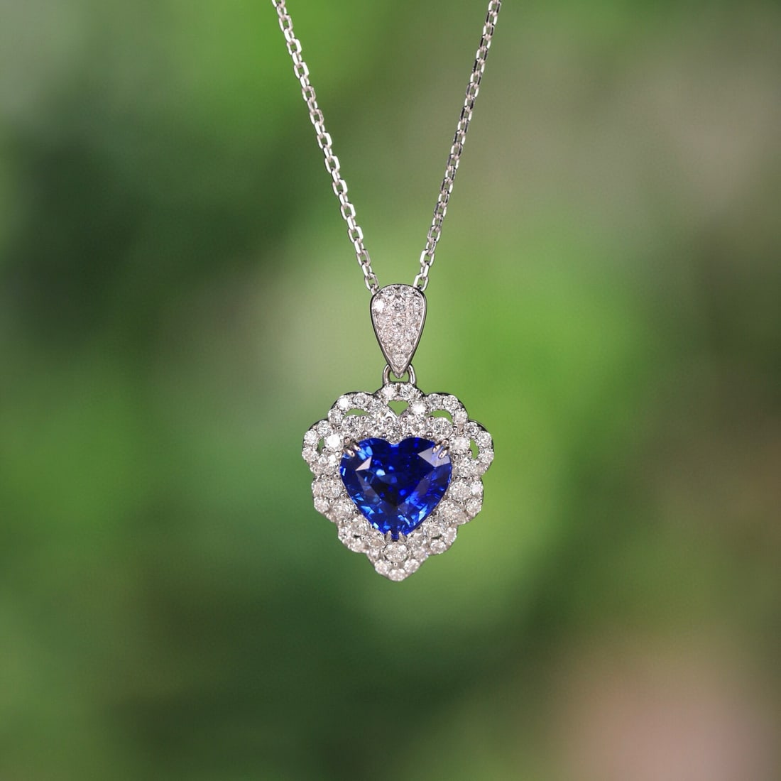 14k Gold 2.00 Ctw Natural Sapphire & Diamond Pendant( Without Chain ): Ref:230950197 // gold content:14k gold // main gemstone:sapphire // shape:heart // carat weight:1. 54ct // color:royal blue // treatment:natural // // adjacent gemstone 2 : diamond // shape:round // c