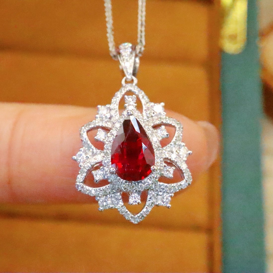 14k Gold 1.48 Ctw Natural Ruby & Diamond Pendant( Without Chain ): Ref:230950244 // gold content:14k gold // main gemstone:ruby // shape:pear // carat weight:1. 02ct // color:pigeonblood red // treatment:natural // // adjacent gemstone 2 : diamond // number of stones