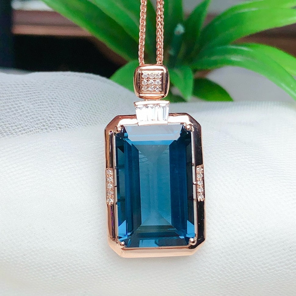 14k Gold 14.45 Ct Natural Topaz & Diamond & Sapphire Pendant( Without Chain ): Ref:230950254 // gold content:14k gold // main gemstone:topaz // shape:octagonal // carat weight:14. 45ct // color:london blue // treatment:natural // // adjacent gemstone 2 : diamond // number of