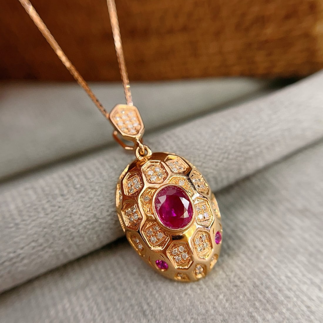 14k Gold 0.55 Ct Natural Ruby & Diamond Pendant( Without Chain ): Ref:230950274 // gold content:14k gold // main gemstone:ruby // shape:oval // carat weight:0. 55ct // color:red // treatment:natural // // adjacent gemstone 2 : diamond // number of stones:63 // shape
