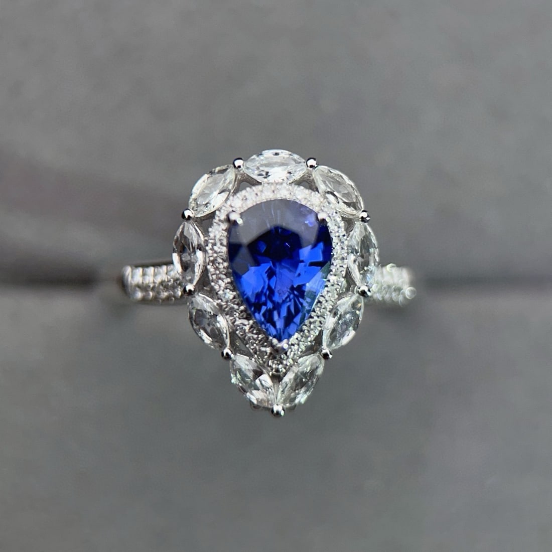 14k Gold 1.2 Ct Natural Sapphire & Diamond & Sapphire Ring/pendant( Without Chain ): Ref:230950321 // gold content:14k gold // ring size:7. 25us // // main gemstone:sapphire // shape:pear // carat weight:1. 2ct // color:blue // treatment:natural // // adjacent gemstone 2 : diamond //