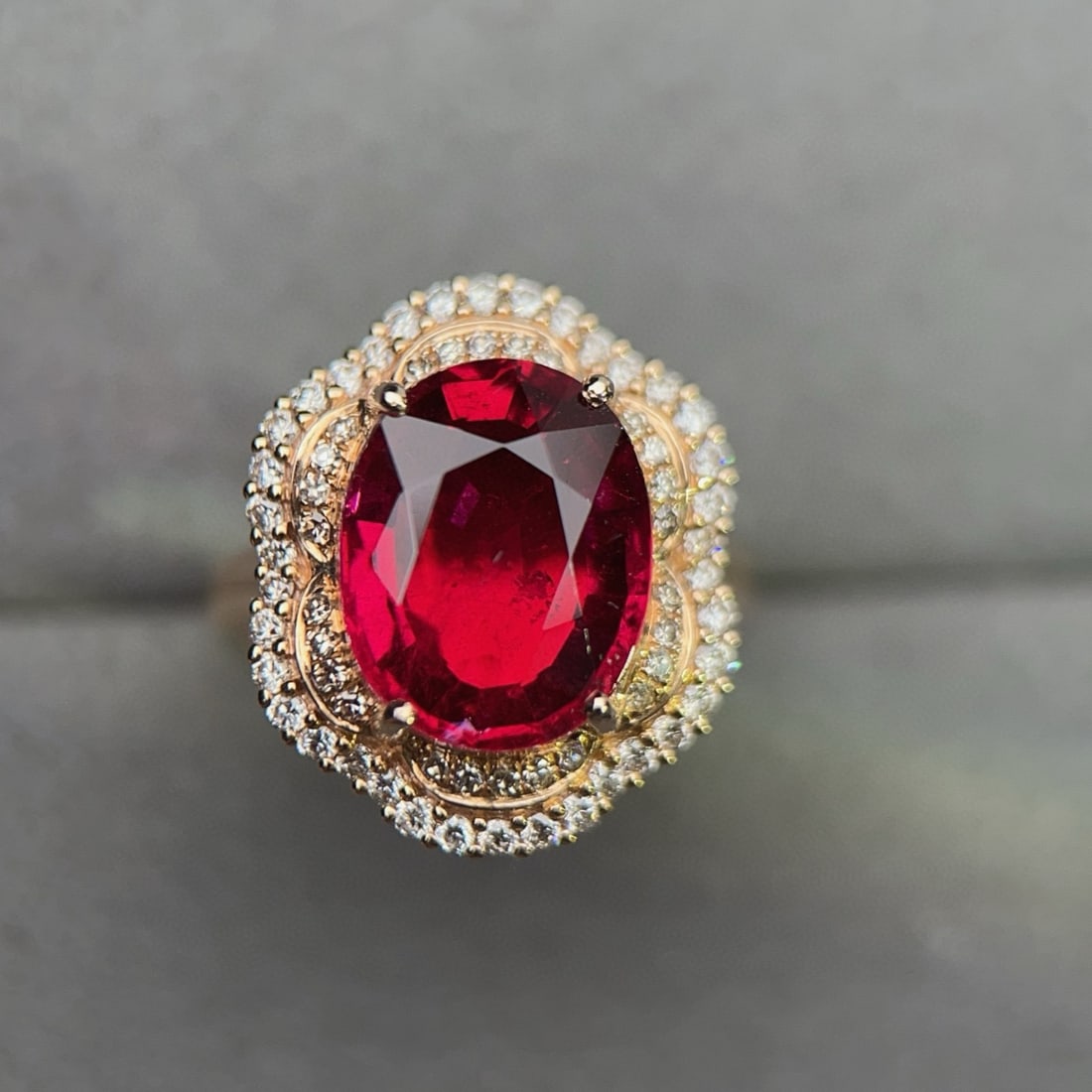 14k Gold 5.29 Ctw Natural Tourmaline & Diamond Ring: Ref:230950324 // gold content:14k gold // ring size:7. 25us // // main gemstone:tourmaline // shape:oval // carat weight:4. 78ct // color:red // treatment:natural // // adjacent gemstone 2 : diamond /
