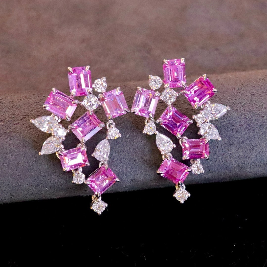 14k Gold 3.70 Ct Natural Padparadscha Sapphire & Diamond Earrings: Ref:230950353 // gold content:14k gold // main gemstone:padparadscha sapphire // shape:octagonal // carat weight:3. 70ct // color:orangish pink // treatment:natural // // adjacent gemstone 2 : diamond