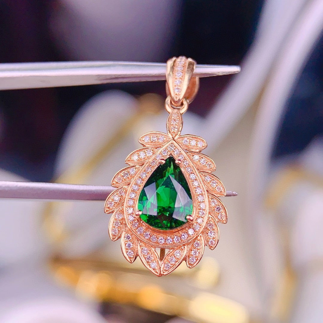 14k Gold 1.35 Ct Vivid Green Natural Tsavorite & Diamond Pendant( Without Chain ): Ref:230950443 // gold content:14k gold // main gemstone:tsavorite // shape:pear // carat weight:1. 35ct // color:vivid green // treatment:natural // // adjacent gemstone 2 : diamond // shape:round