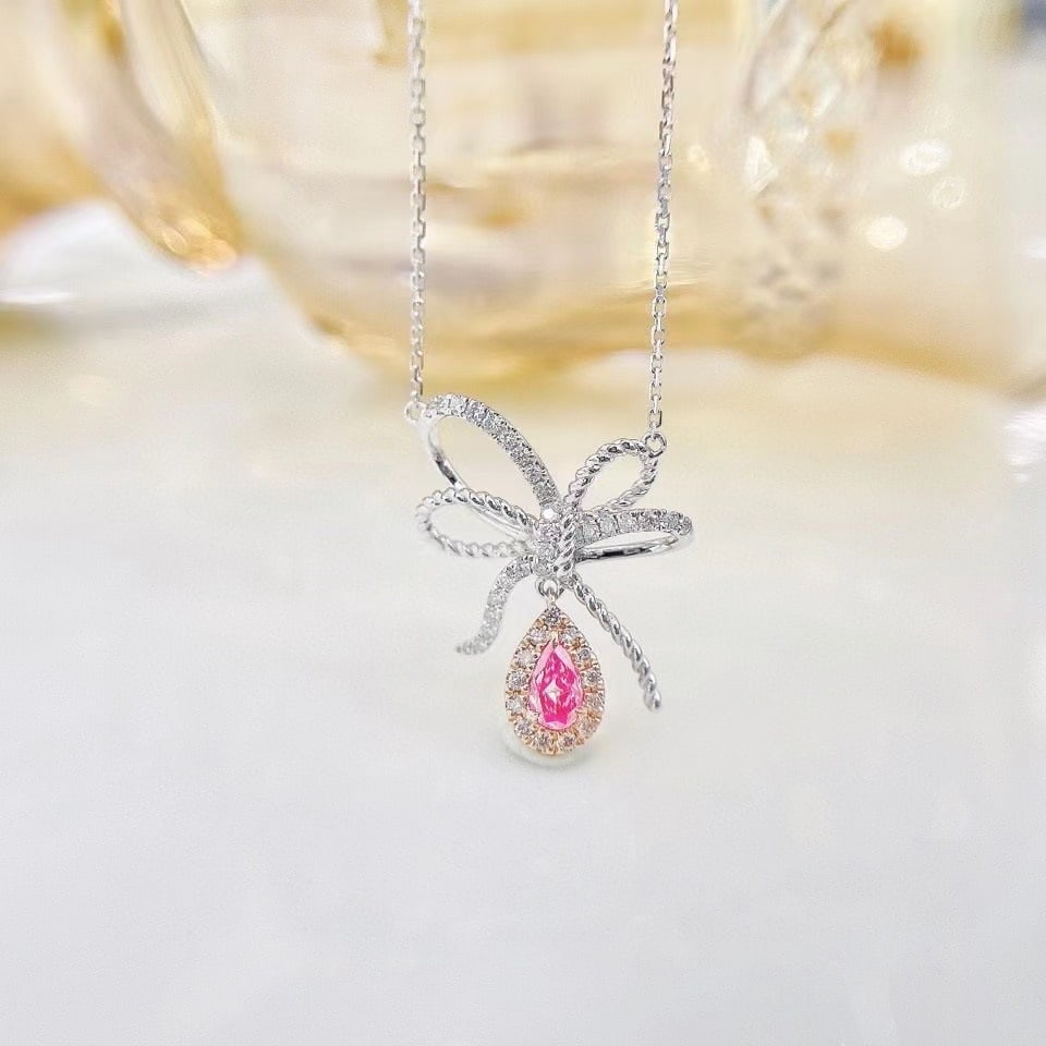 14k Gold 0.30 Ctw Natural Pink Diamond & Diamond Necklace: Ref:230951025 // gold content:14k gold // main gemstone:pink diamond // shape:pear // carat weight:0. 13ct // color:pink // treatment:natural // // adjacent gemstone 2 : diamond // shape:round // cara