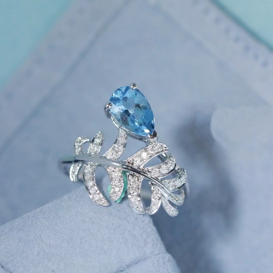 14k Gold 0.89 Ct Natural Aquamarine & Diamond Ring: Ref:230951041 // gold content:14k gold // ring size:7. 25us // // main gemstone:aquamarine // shape:pear // carat weight:0. 89ct // color:santa maria color // treatment:natural // // adjacent gemstone