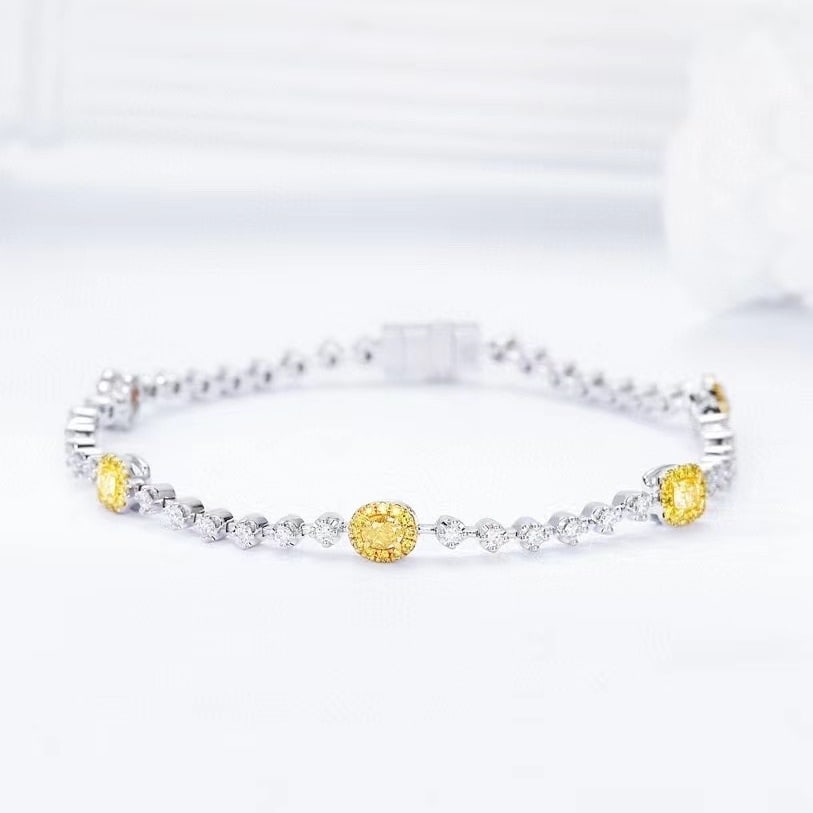 14k Gold 1.57 Ctw Natural Yellow Diamond & Diamond Bracelet: Ref:230951044 // gold content:14k gold // main gemstone:yellow diamond // shape:multiply // carat weight:0. 66ct // color:yellow // treatment:natural // // adjacent gemstone 2 : diamond // shape:round