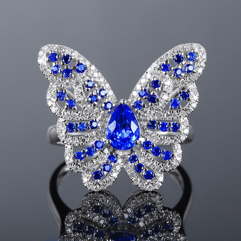 14k Gold 1.02 Ctw Vivid Blue Natural Sapphire & Diamond & Butterfly Ring: Ref:230951050 // gold content:14k gold // ring size:7. 25us // // main gemstone:sapphire // shape:pear // carat weight:0. 65ct // color:vivid blue // treatment:natural // // adjacent gemstone 2 : diam