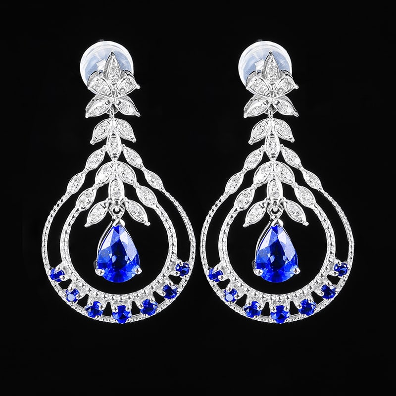 14k Gold 1.48 Ctw Natural Sapphire & Diamond Earrings: Ref:230951052 // gold content:14k gold // main gemstone:sapphire // shape:pear // carat weight:1. 25ct // color:cornflower blue // treatment:natural // // adjacent gemstone 2 : diamond // number of