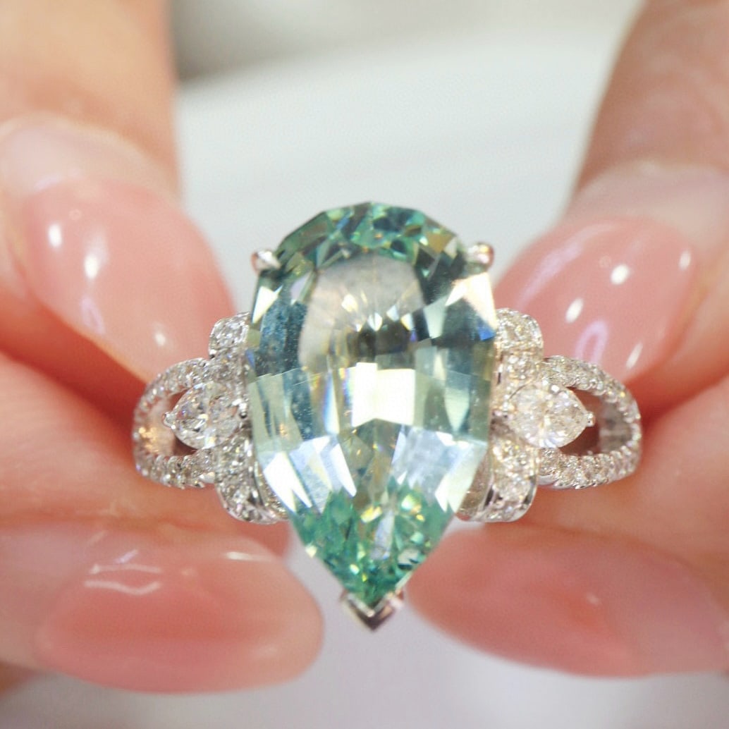 14k Gold 3.16 Ctw Natural Aquamarine & Diamond Ring: Ref:230951078 // gold content:14k gold // ring size:7. 25us // // main gemstone:aquamarine // shape:pear // carat weight:2. 8ct // color:bluish green // treatment:natural // // adjacent gemstone 2