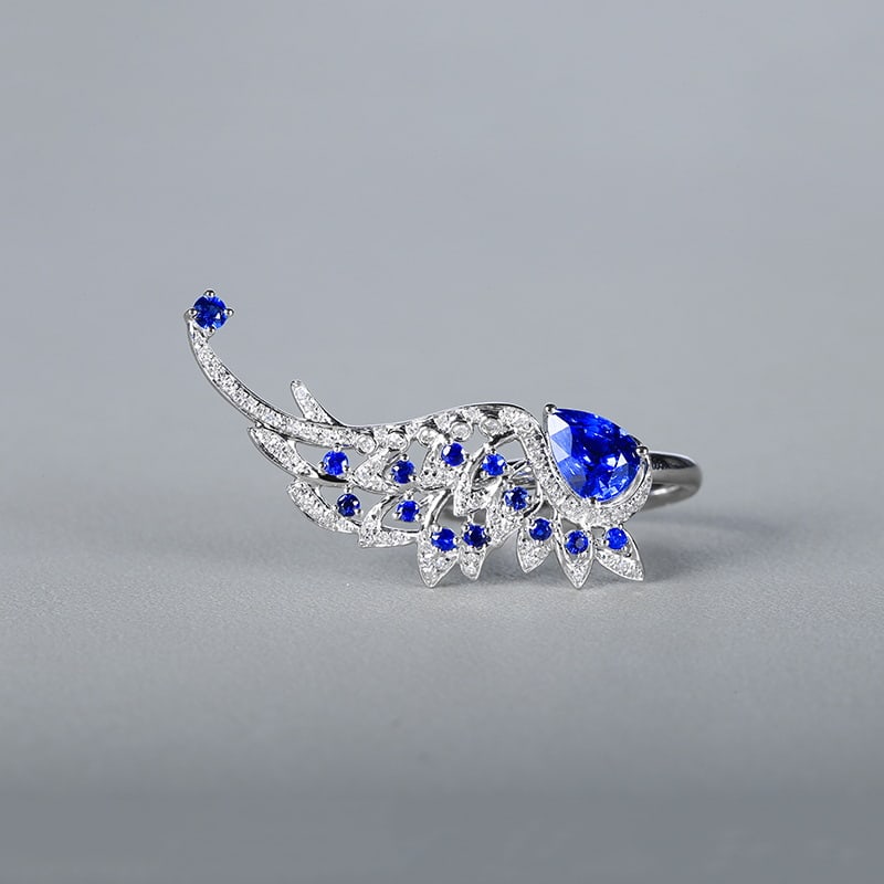 14k Gold 1.67 Ctw Natural Sapphire & Diamond Ring: Ref:230951097 // gold content:14k gold // ring size:7. 25us // // main gemstone:sapphire // shape:pear // carat weight:1. 42ct // color:royal blue // treatment:natural // // adjacent gemstone 2 :