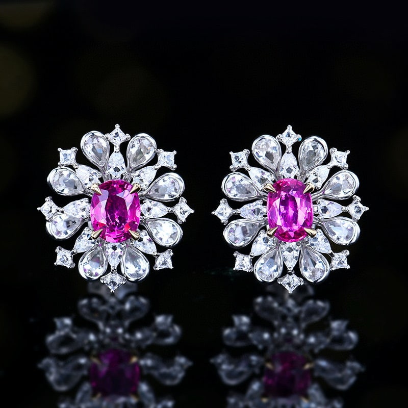 14k Gold 1.17 Ct Natural Padparadscha Sapphire & Sapphire Earrings: Ref:230951140 // gold content:14k gold // main gemstone:padparadscha sapphire // shape:oval // carat weight:1. 17ct // color:orangish pink // treatment:natural // // adjacent gemstone 2 : sapphire //