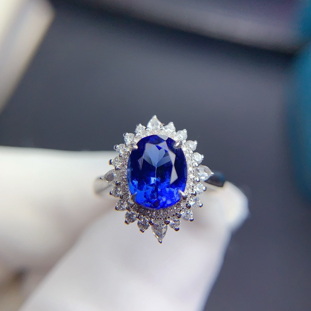 14k Gold 2.42 Ct Natural Tanzanite & Diamond Ring: Ref:230951149 // gold content:14k gold // ring size:7. 25us // // main gemstone:tanzanite // shape:oval // carat weight:2. 42ct // color:blue // treatment:natural // // adjacent gemstone 2 : diamond /
