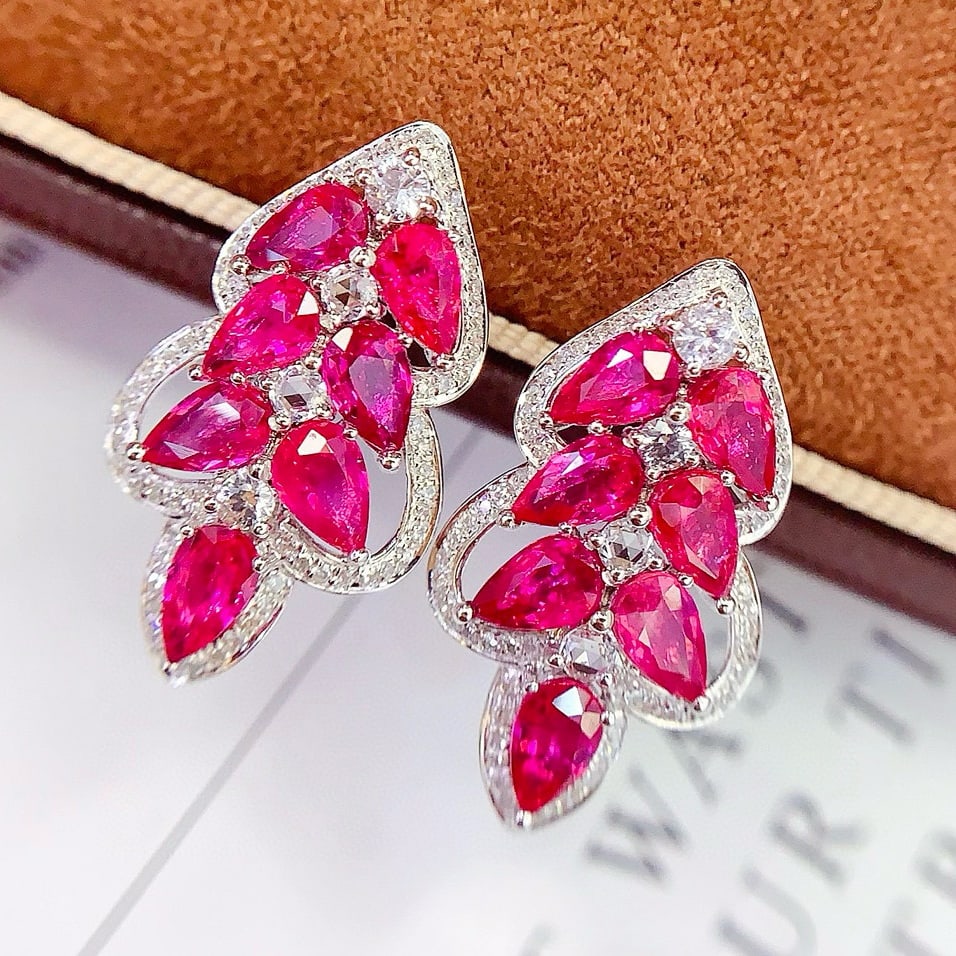 14k Gold 6.25 Ct Natural Ruby & Diamond Earrings: Ref:230951160 // gold content:14k gold // main gemstone:ruby // shape:pear // carat weight:6. 25ct // color:red // treatment:natural // // adjacent gemstone 2 : diamond // number of stones:132 //
