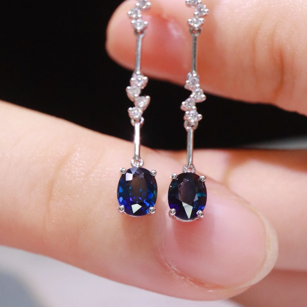 14k Gold 1.1 Ctw Natural Sapphire & Diamond Earrings: Ref:230951184 // gold content:14k gold // main gemstone:sapphire // shape:oval // carat weight:1ct // color:blue // treatment:natural // // adjacent gemstone 2 : diamond // shape:round // carat
