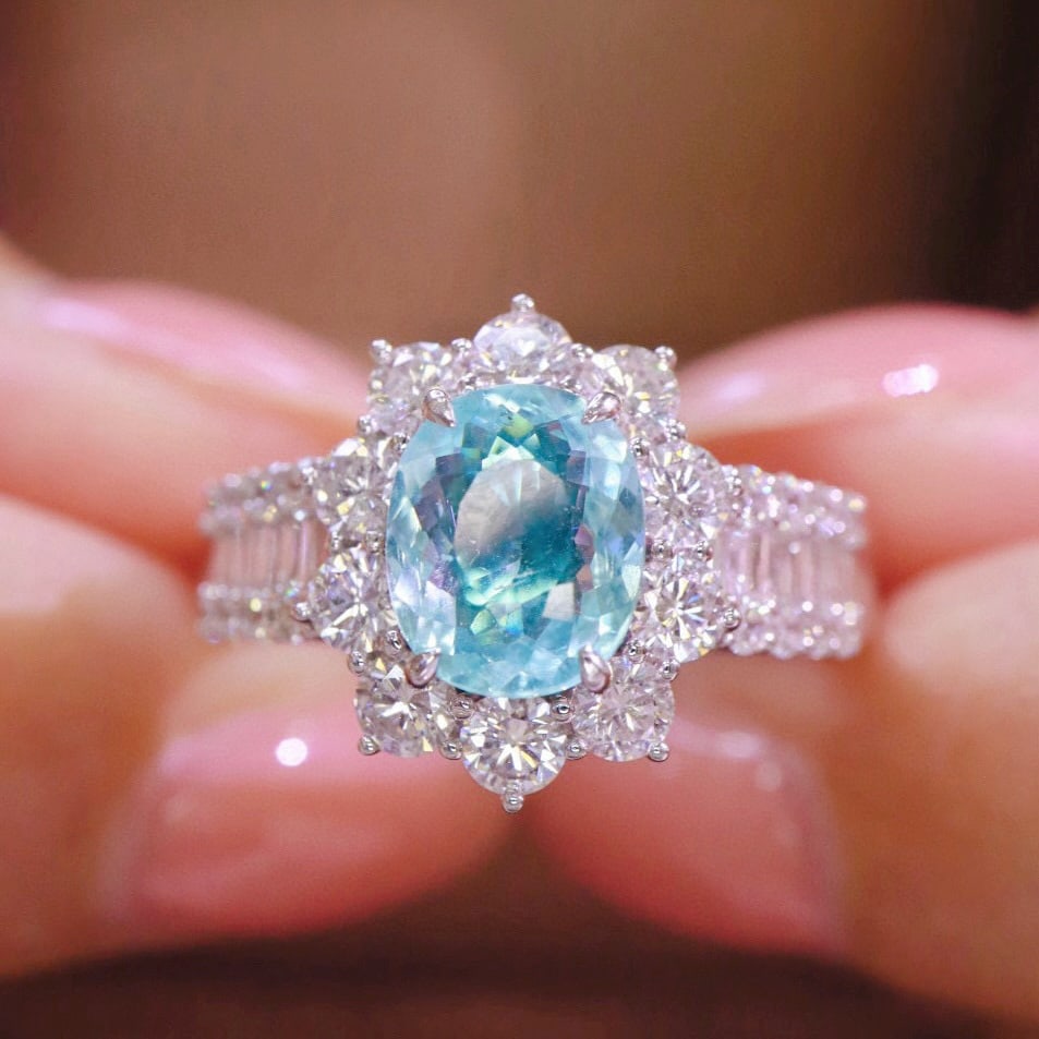 14k Gold 2.42 Ctw Natural Paraiba Tourmaline & Diamond Ring: Ref:230951195 // gold content:14k gold // ring size:7. 25us // // main gemstone:paraiba tourmaline // shape:oval // carat weight:1. 12ct // color:blue // treatment:natural // // adjacent gemstone