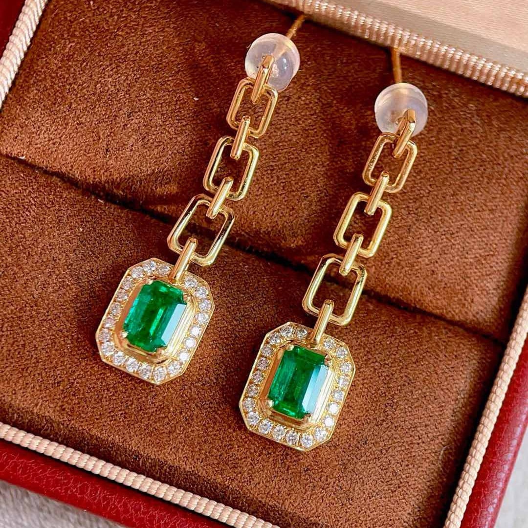 14k Gold 1.94 Ctw Vivid Green Natural Emerald & Diamond Earrings: Ref:230951202 // gold content:14k gold // main gemstone:emerald // shape:octagonal // carat weight:1. 52ct // color:vivid green // treatment:natural // // adjacent gemstone 2 : diamond // shape:round