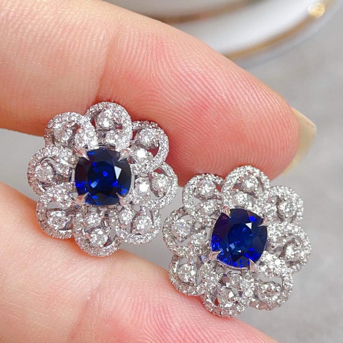 14k Gold 4.07 Ctw Natural Sapphire & Diamond Earrings: Ref:230951213 // gold content:14k gold // main gemstone:sapphire // shape:cushion // carat weight:2. 71ct // color:royal blue // treatment:natural // // adjacent gemstone 2 : diamond // shape:round //