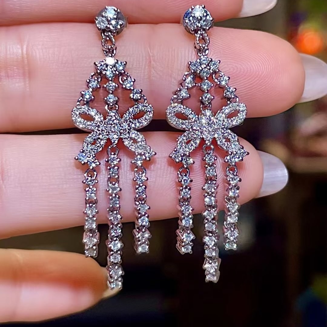 14k Gold 1.45 Ct Natural H Diamond Earrings: Ref:230951224 // gold content:14k gold // main gemstone:diamond // shape:round // carat weight:1. 45ct // clarity grade:vs-si // color:h // treatment:natural // cut grade:g // Condition: New Low Esti