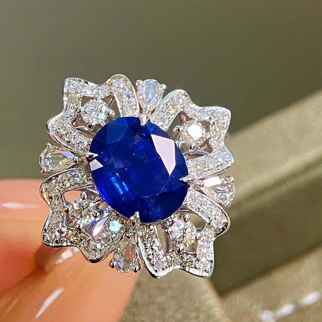 14k Gold 2.64 Ctw Natural Sapphire & Diamond Ring: Ref:230951226 // gold content:14k gold // ring size:7. 25us // // main gemstone:sapphire // shape:oval // carat weight:2. 11ct // color:royal blue // treatment:natural // // adjacent gemstone 2 : diam